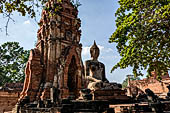 Ayutthaya, Thailand. Wat Mahathat, a small vihara with a chedi and a Buddha image near the eastern side of the eclosure  